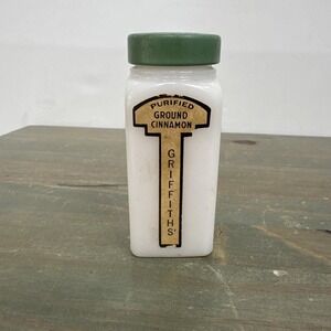 Vintage Griffith's Cinnamon 3/4 oz spice bottle White Milkglass jar Green lid